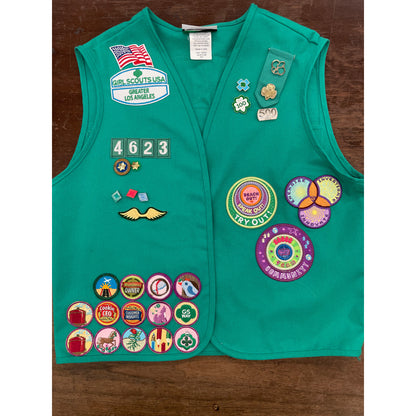 We sew patches on  Scout Uniform