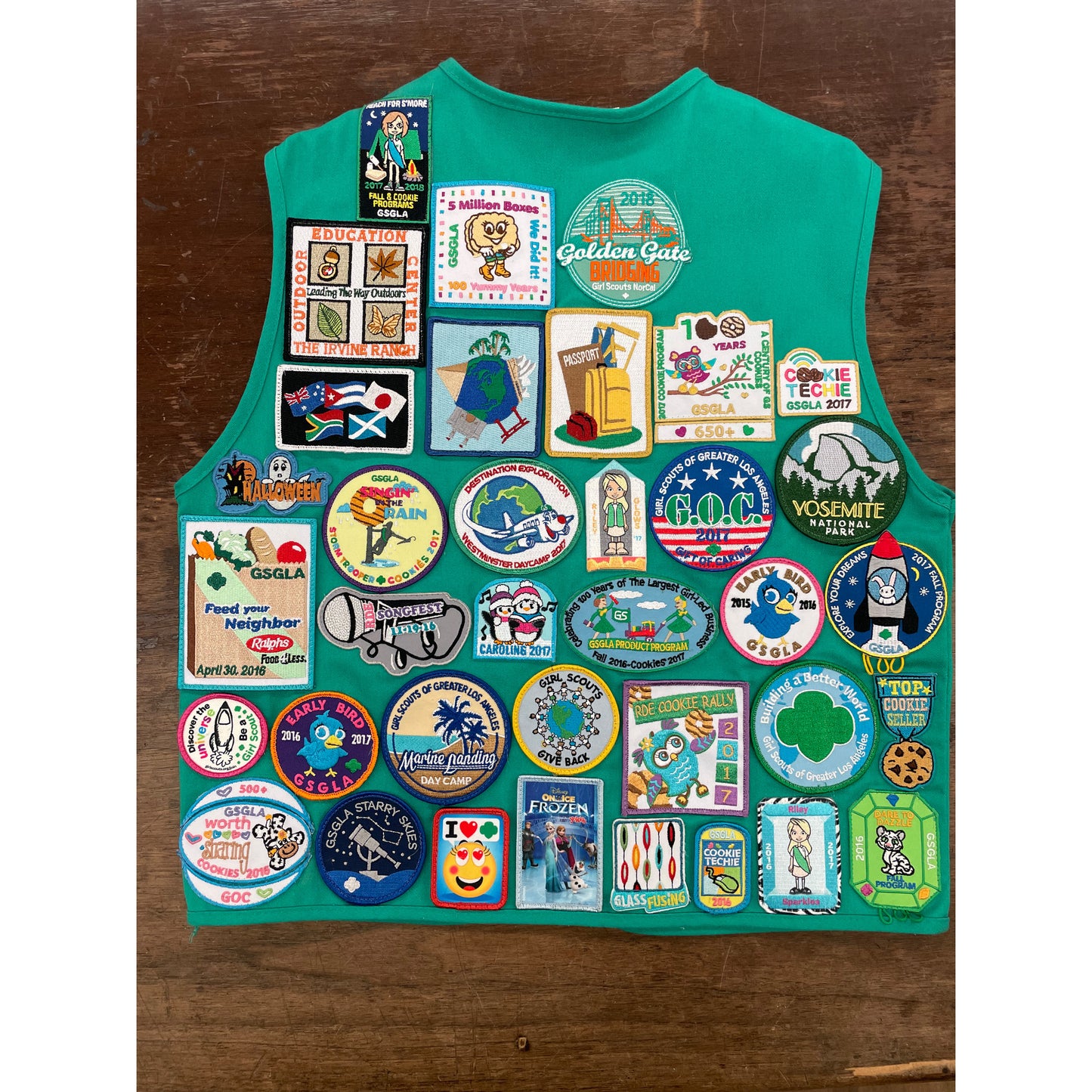 We sew patches on  Scout Uniform